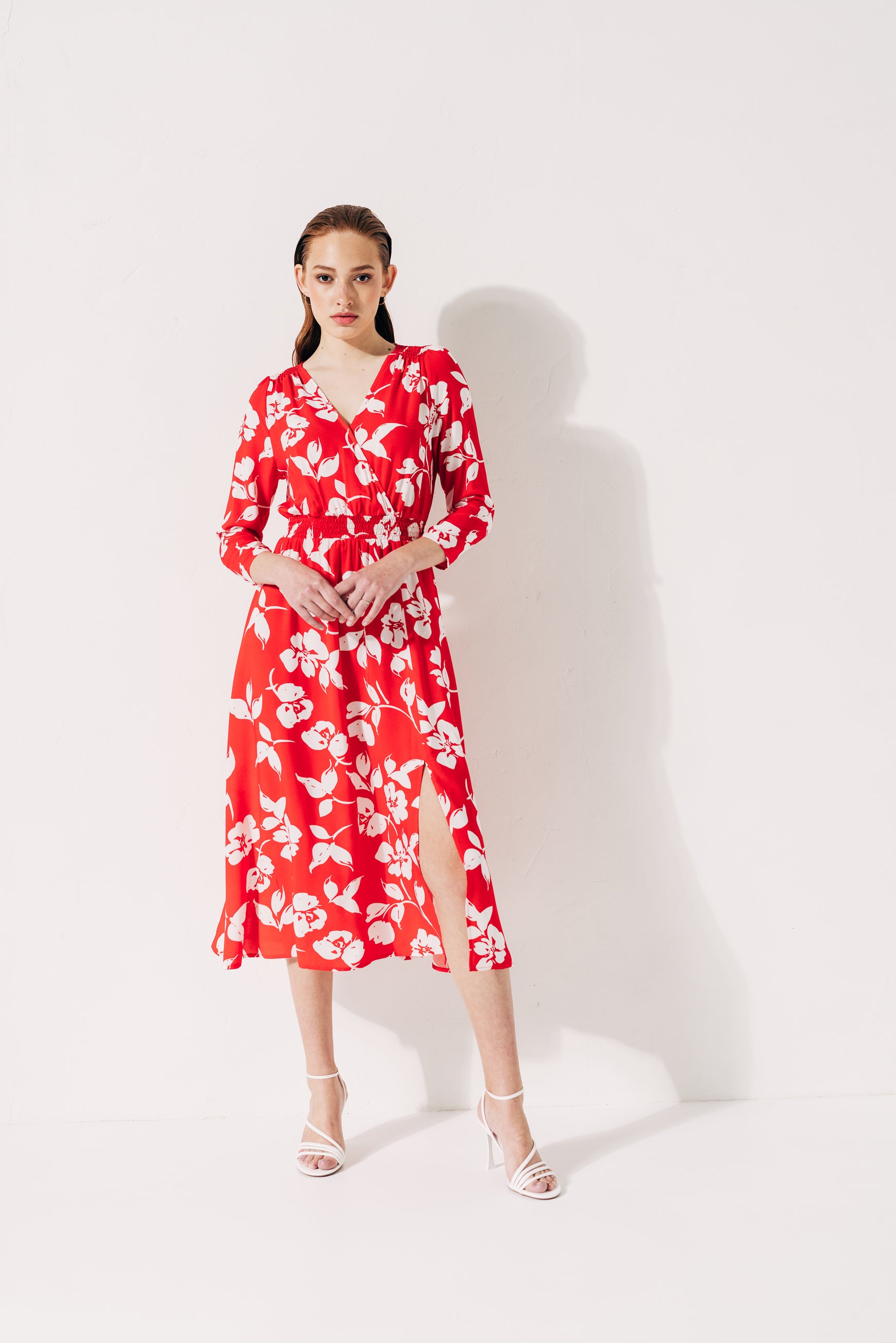 100% Viscose floral print midi dress with 3/4 sleeves and V-neckline