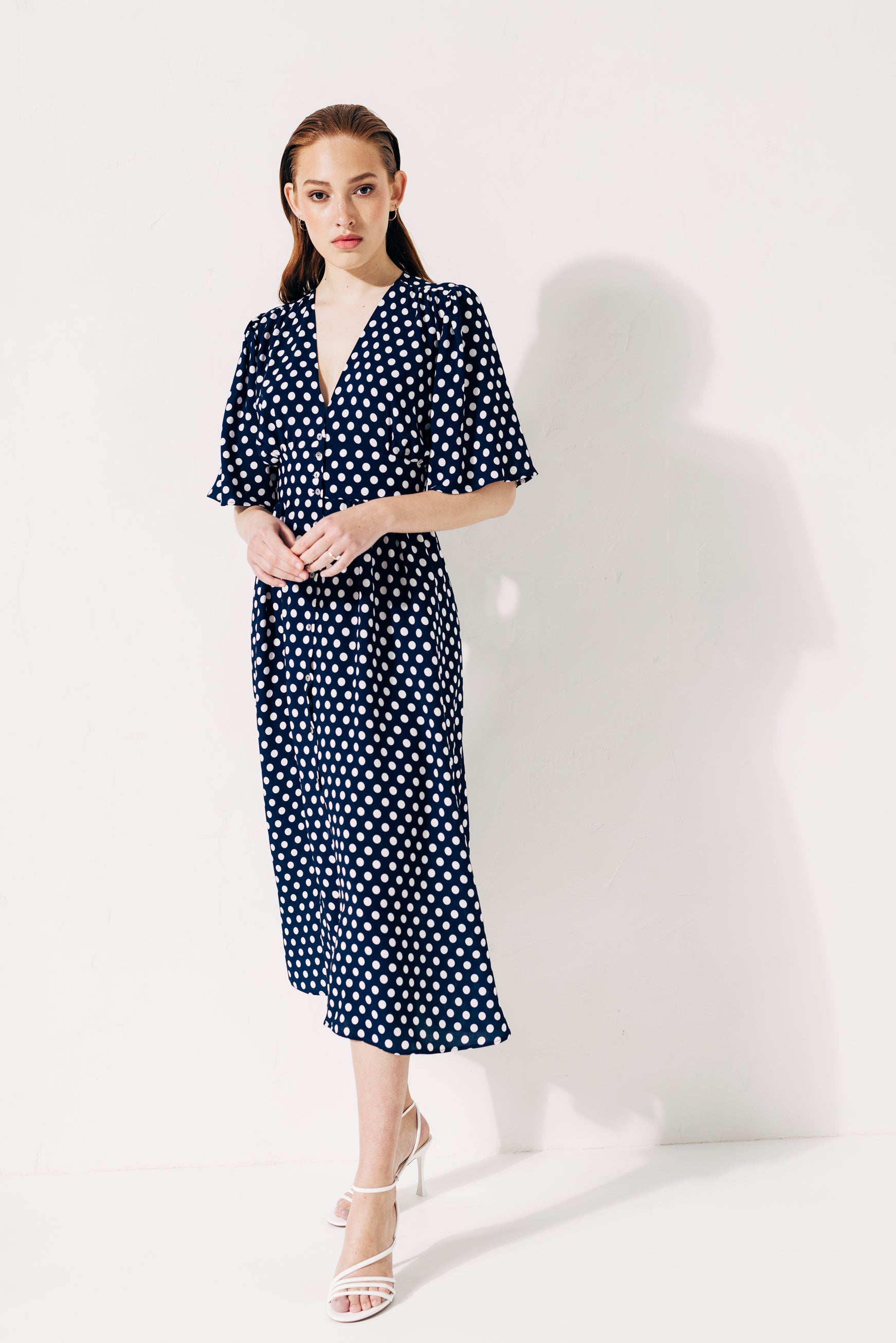 100% Viscose polka dot print midi dress with button up front