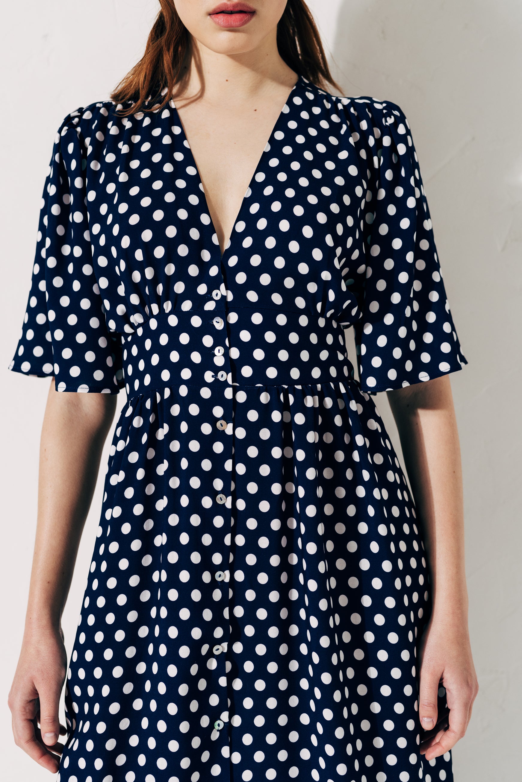 100% Viscose polka dot print midi dress with button up front