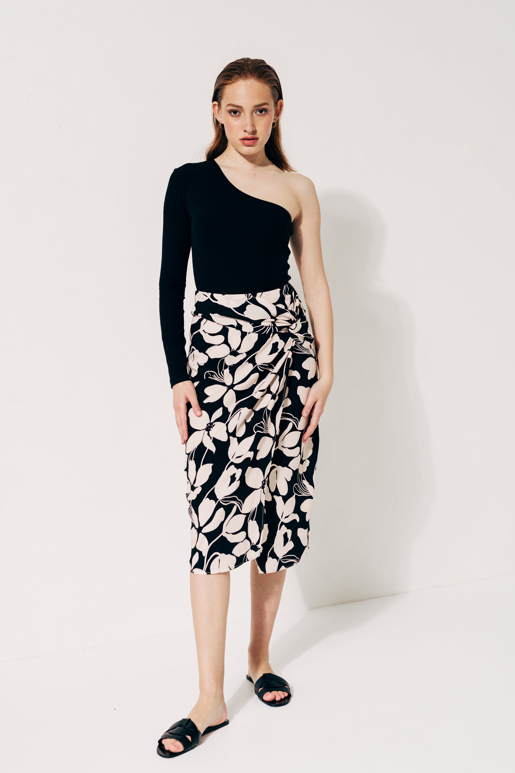 100% Viscose floral print midi skirt with side knot and slit
