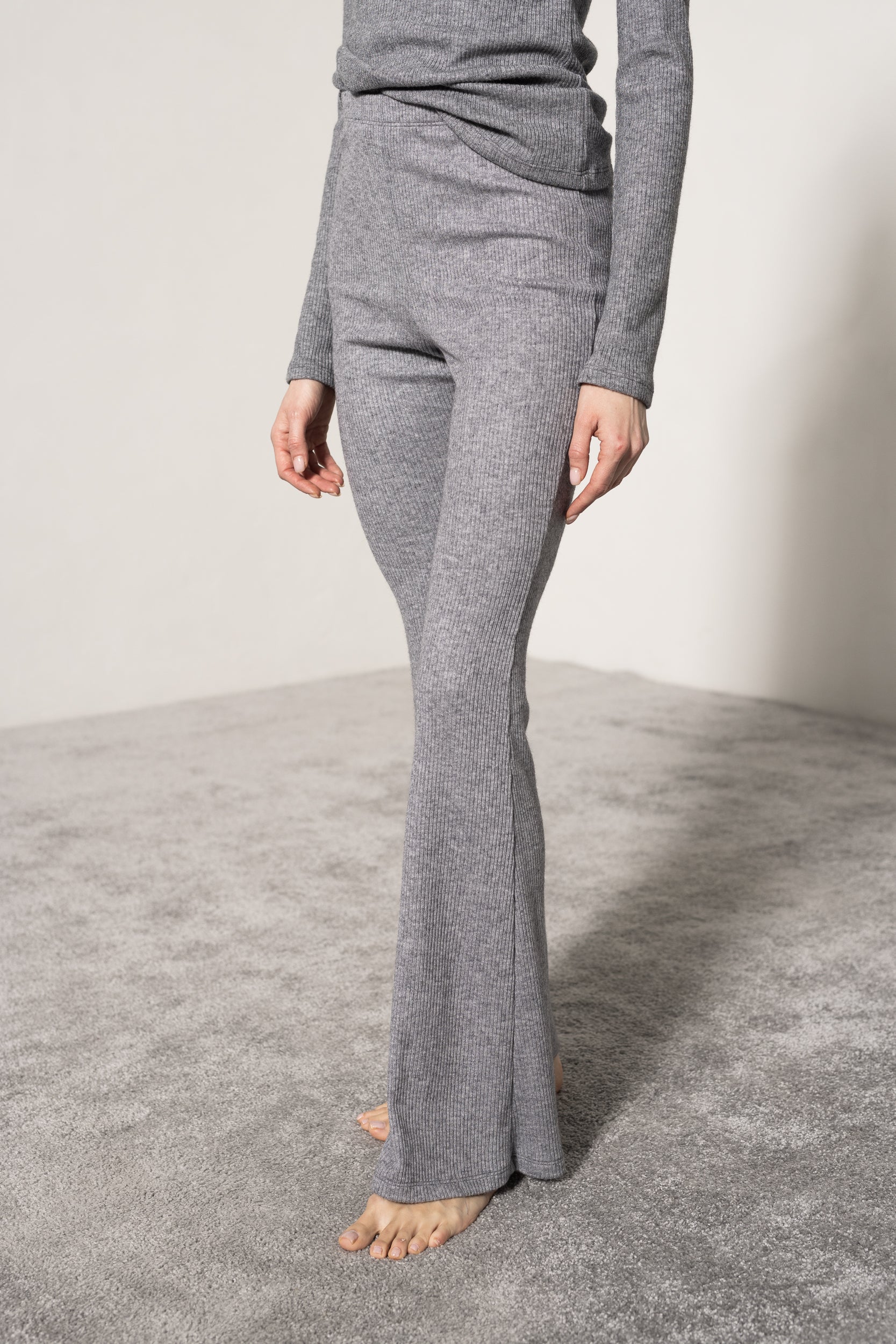 High-waist flared knitted trousers
