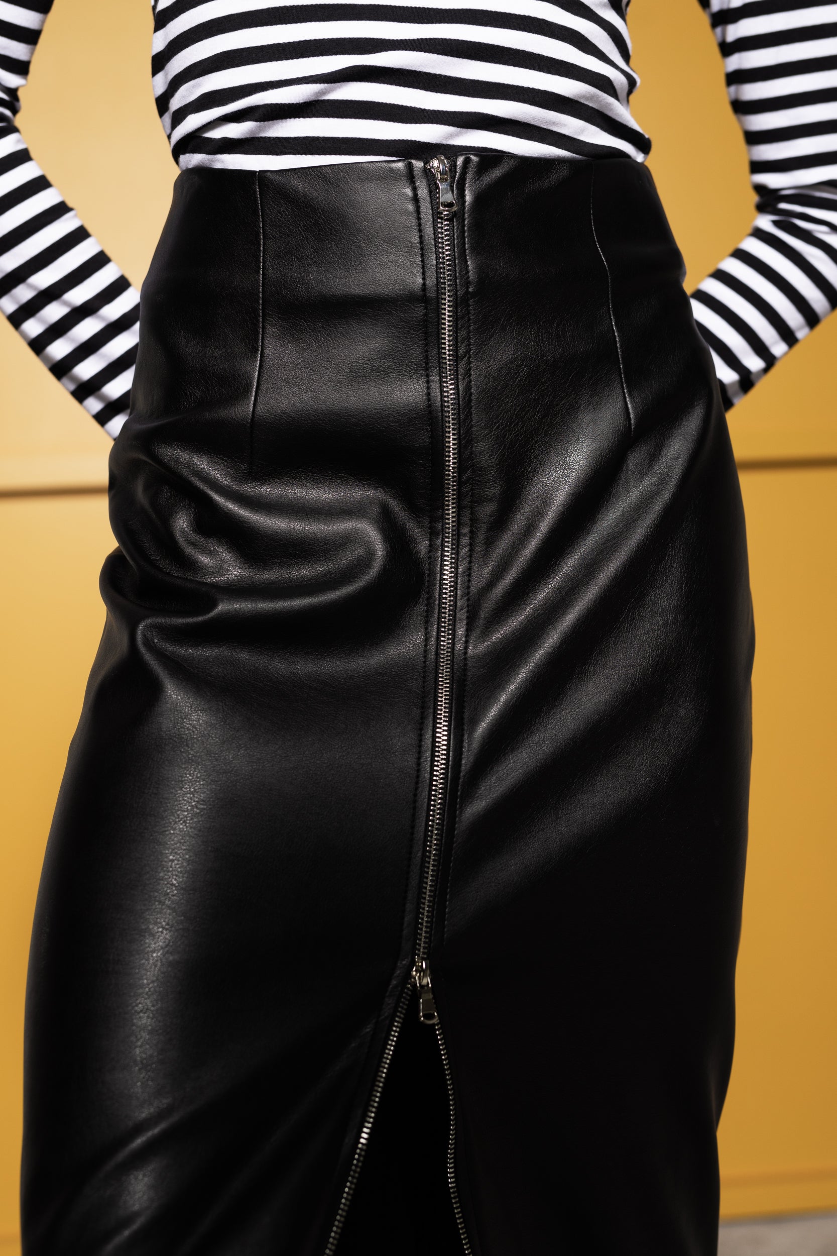 Faux leather midi skirt with front metal zip