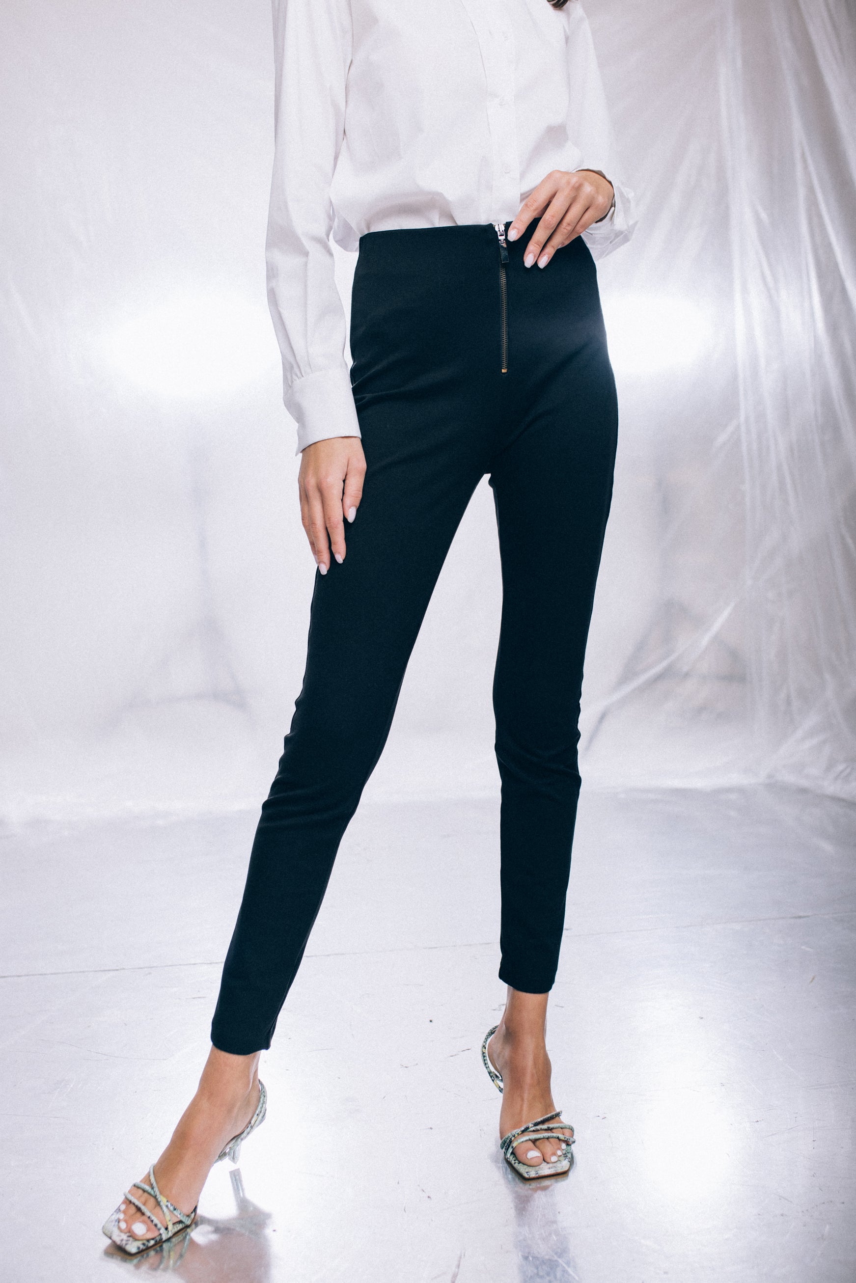 High-waist trousers with front metal zip