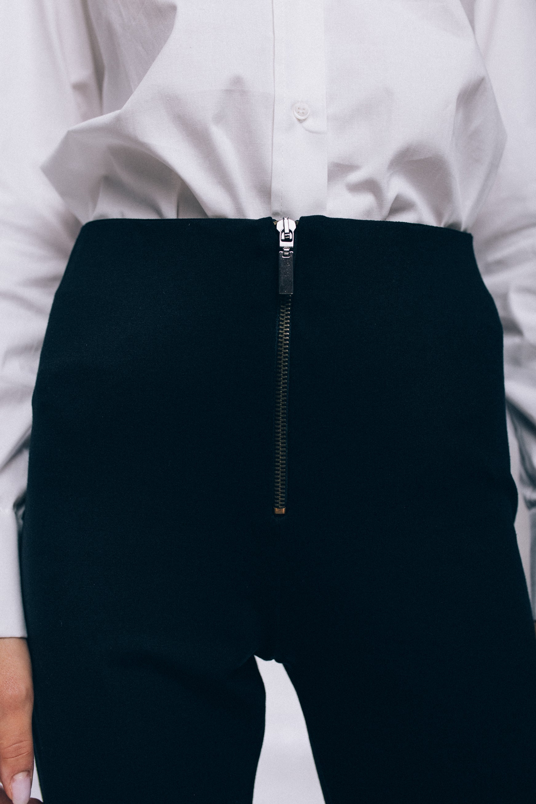High-waist trousers with front metal zip